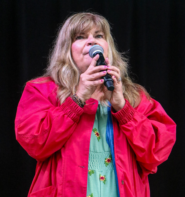 MC Cindy Baucom at the 2026 Tony Rice Memorial MusicFest - photo © G. Nicholas Hancock