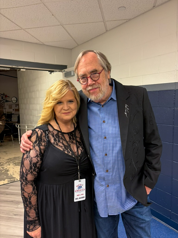 Tony Trischka and Gena Britt backstage at Music America: Songs That Shaped Us at the Bruce Springsteen Center (6/4/26) - photo © Ariel Rosenberg