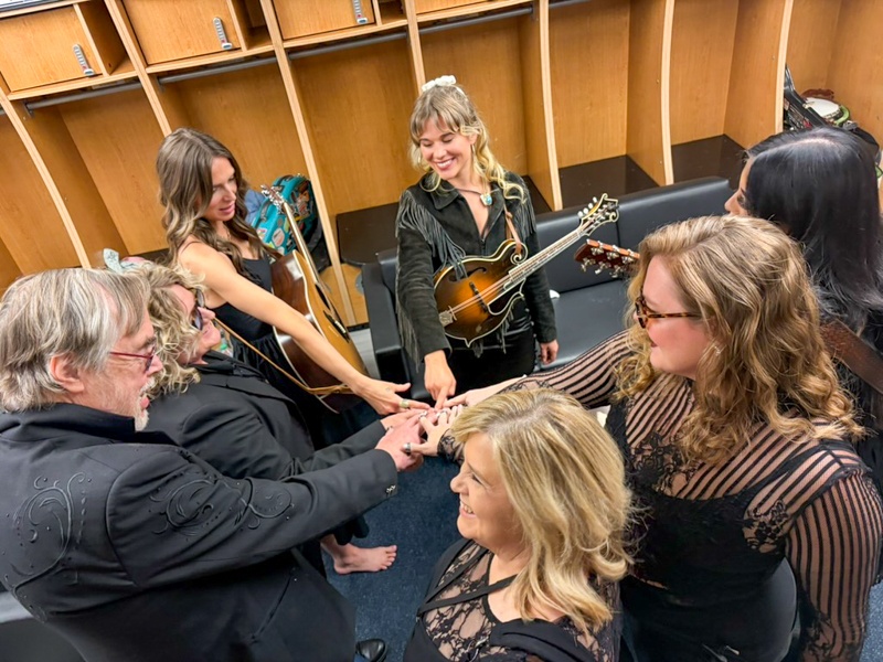 Tony Trischka and Sister Sadie huddle up backstage before their set at Music America: Songs That Shaped Us at the Bruce Springsteen Center (6/4/26) - photo © Ariel Rosenberg