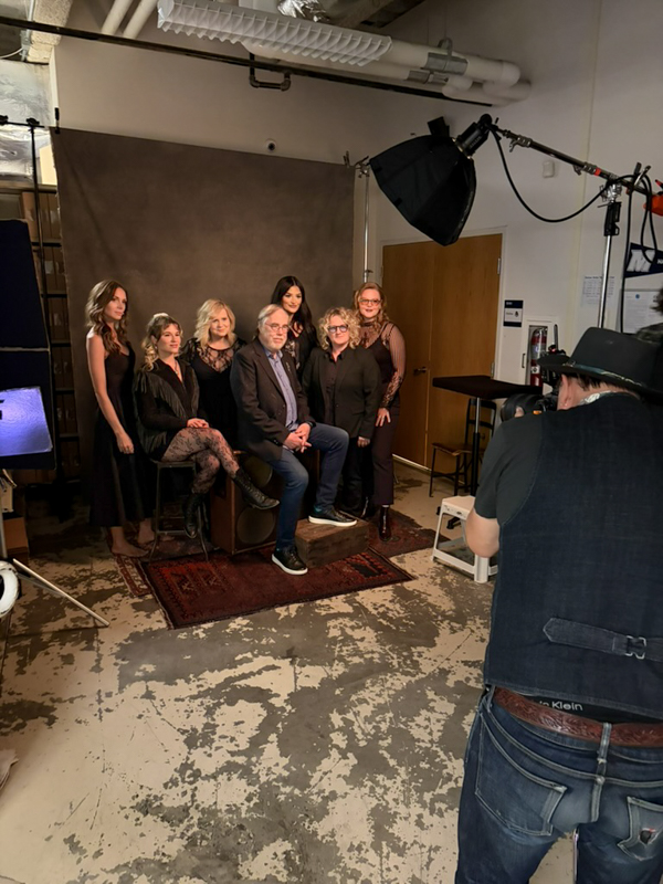 Tony Trischka and Sister Sadie have their portrait taken at Music America: Songs That Shaped Us at the Bruce Springsteen Center (6/4/26) - photo © Ariel Rosenberg