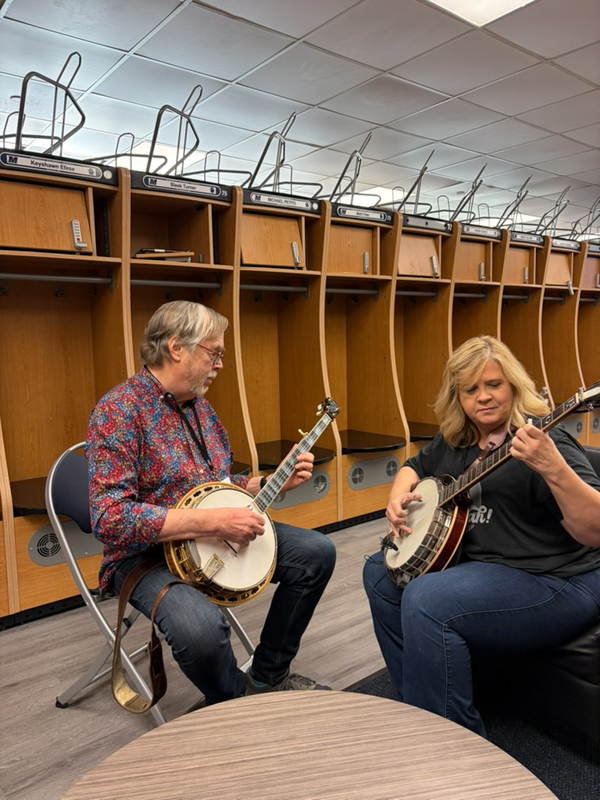 Tony Trischka and Gena Britt backstage at Music America: Songs That Shaped Us at the Bruce Springsteen Center (6/4/26) - photo © Ariel Rosenberg