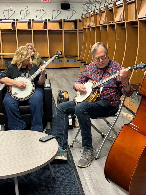 Gena Britt and Tony Trischka backstage at Music America: Songs That Shaped Us at the Bruce Springsteen Center (6/4/26) - photo © Ariel Rosenberg