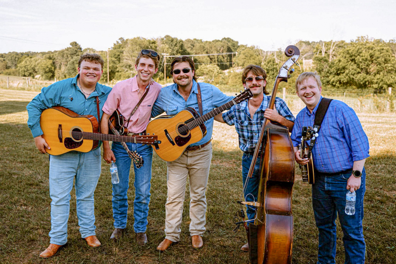 Colton Baker with Iron Mountain backstage at Gospel on the Farm 2026 - photo courtesy of The Gospel Plowboys