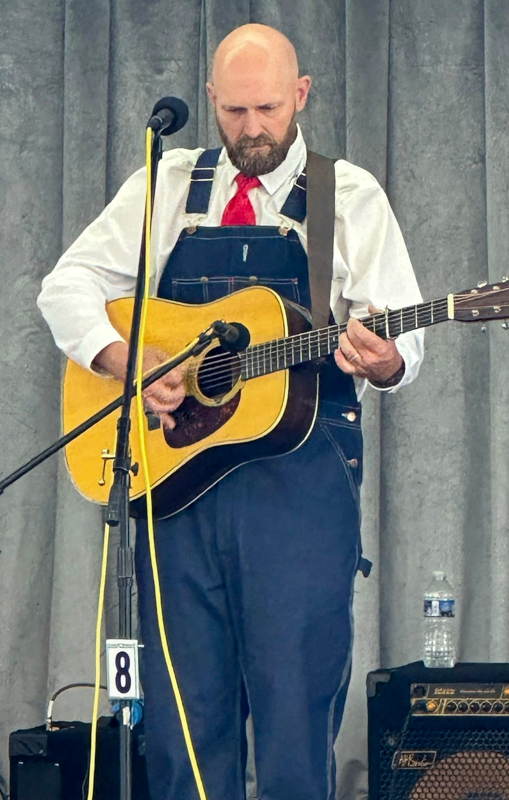 Michael Jenkins with The Gospel Plowboys at Gospel on the Farm 2026 - photo courtesy of The Gospel Plowboys
