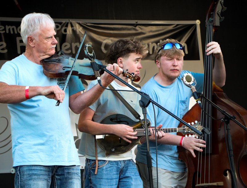 Alden Nunn, Elijah Smith, Levi Head at the 2026 Mount Airy Fiddlers' Convention - photo © G. Nicholas Hancock