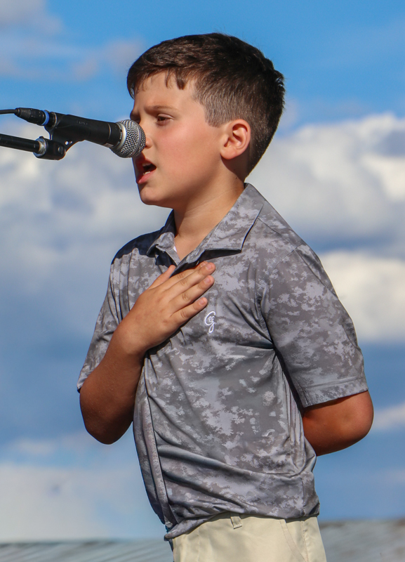 Carrson Blankenship singing the National Anthem at the 2026 Abingdon Fiddlers' Convention - photo © G. Nicholas Hancock