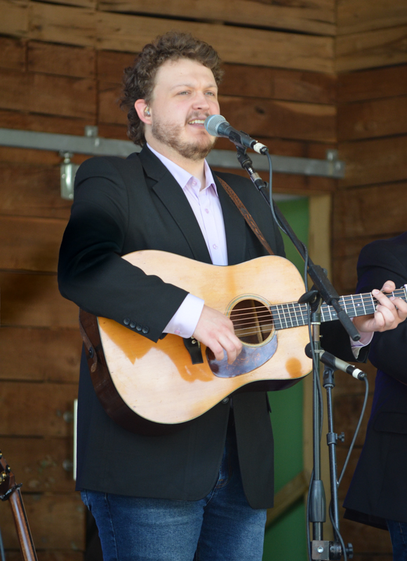 Zack Arnold with Rhonda Vincent & The Rage at Farm Jamb 2026 - photo © Roger Black