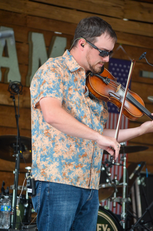 Nathan Aldridge with The Dan Tyminski Band at Farm Jamb 2026 - photo © Roger Black