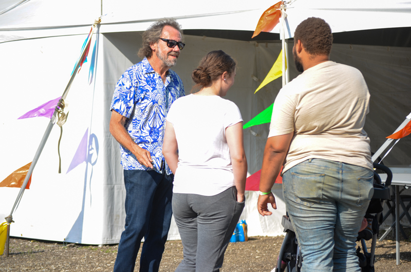 Dan Tyminski chats backstage at Farm Jamb 2026 - photo © Roger Black