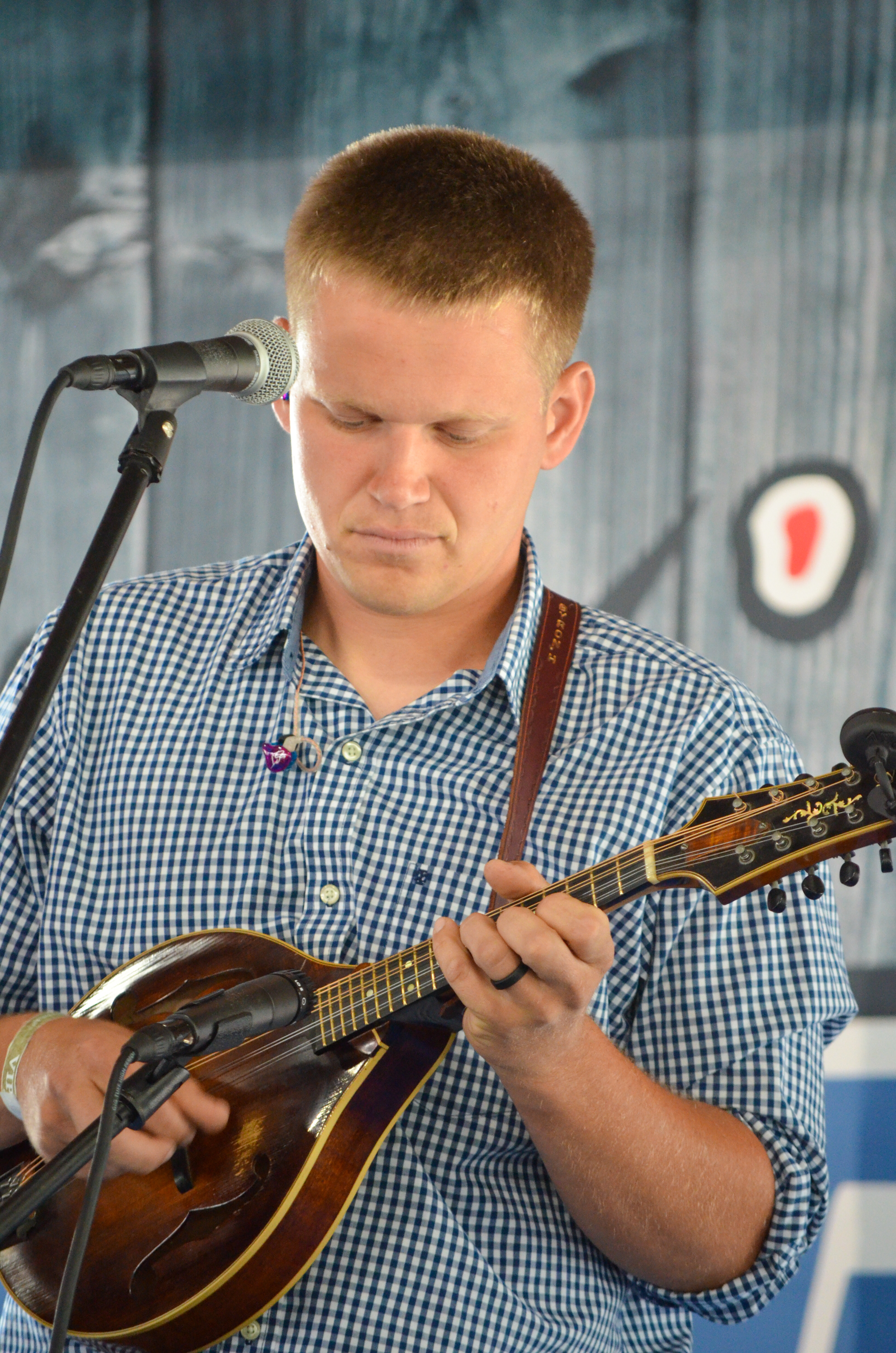 Bryon Holbrook with the West Liberty Mountain Boys at Blazin Bluegrass 2026 - photo © Roger Black