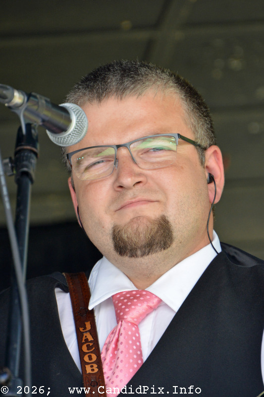 Adam Burrows with Larry Efaw & The Bluegrass Mountaineers at the 2026 Cherokee Bluegrass Festival - photo © Bill Warren