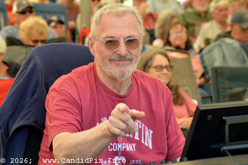 John Holder manning the board at the 2026 Cherokee Bluegrass Festival - photo © Bill Warren