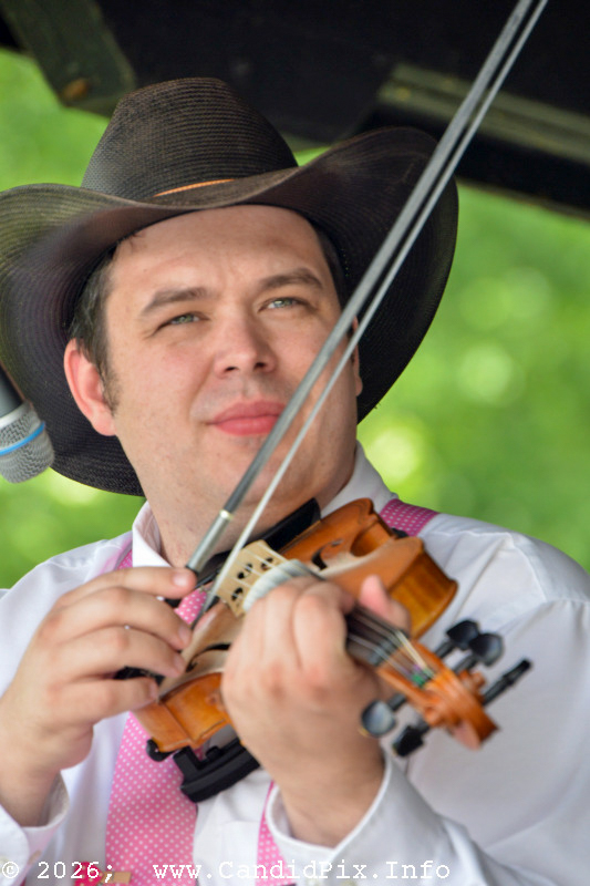 Adam Burrowswith Lorraine Jordan & Carolina Road at the 2026 Cherokee Bluegrass Festival - photo © Bill Warren