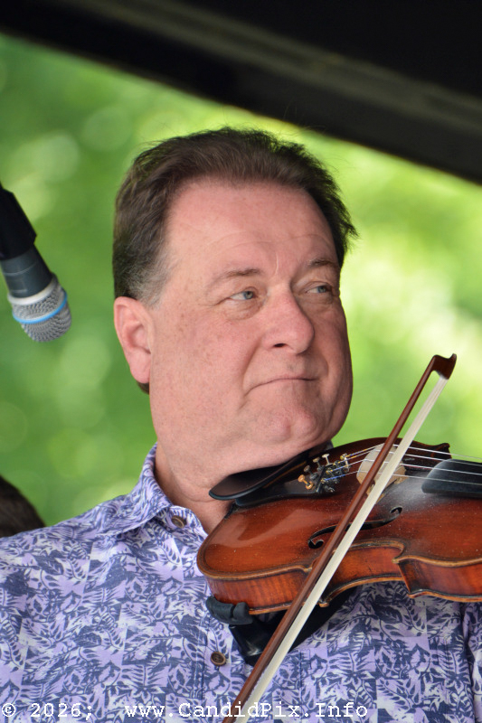 Steve Day with Lorraine Jordan & Carolin Road at the 2026 Cherokee Bluegrass Festival - photo © Bill Warren