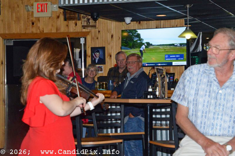 Melody Williamson Keyes serenades and audience member with Williamson Branch at Hilliards Corner Lounge - photo © Bill Warren