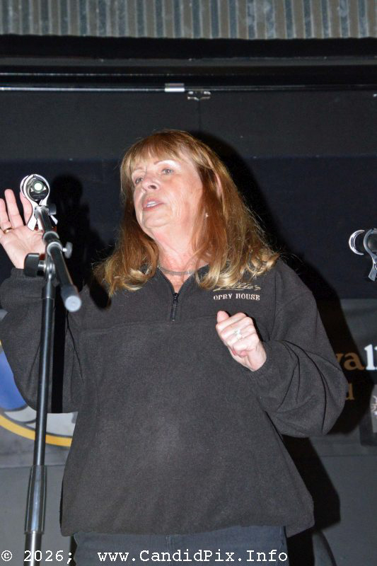 Terri Grannis introduces the Charlotte Bluegrass Band at the Windwalker in Charlotte, MI - photo © Bill Warren