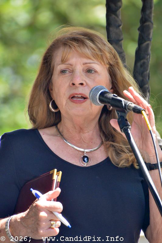 MC Terri Grannis at the 2026 Charlotte Bluegrass Festival - photo © Bill Warren