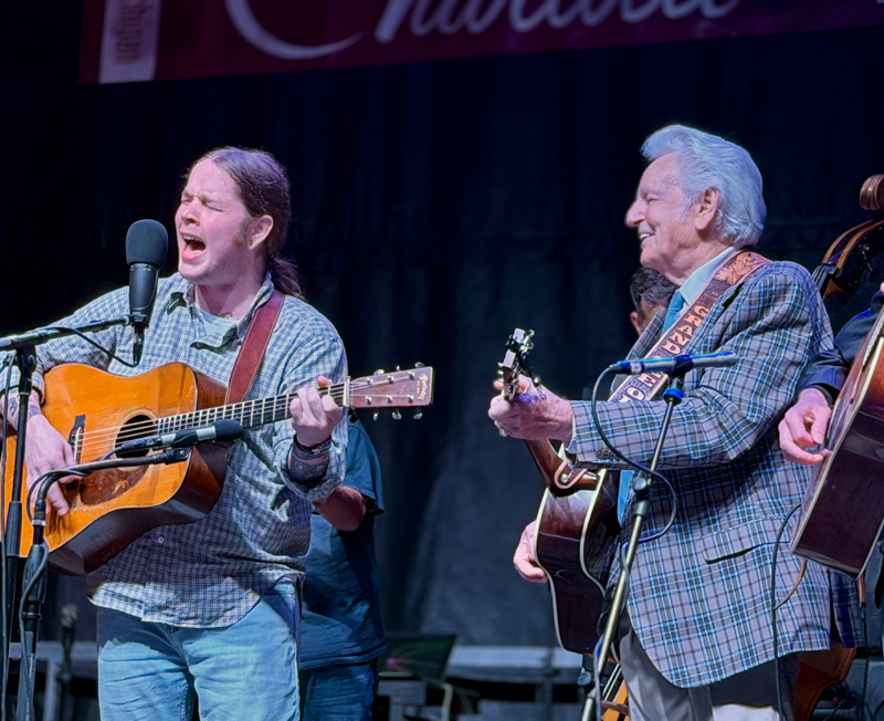 Billy Strings with the Del McCoury Band at the 2026 Charlotte Bluegrass Festival - photo © Elizabeth Loring