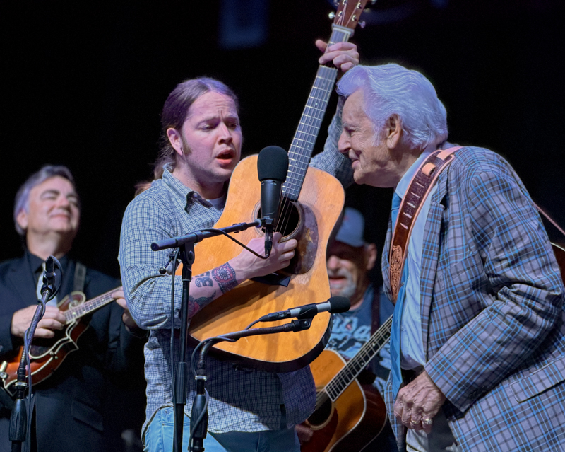 Billy Strings with Del McCoury at the 2026 Charlotte Bluegrass Festival - photo © Elizabeth Loring