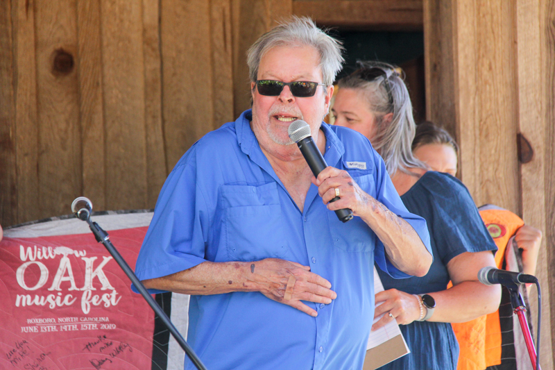MC Buddy Michaels at the 2026 Willow Oak Bluegrass Festival - photo © Laura Ridge