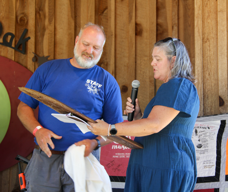Custom plaque presented to Mike Wilson at the 2026 Willow Oak Bluegrass Festival - photo © Laura Ridge