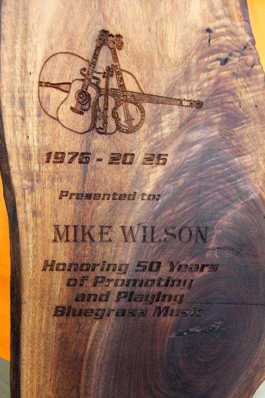Custom plaque presented to Mike Wilson at the 2026 Willow Oak Bluegrass Festival - photo © Laura Ridge