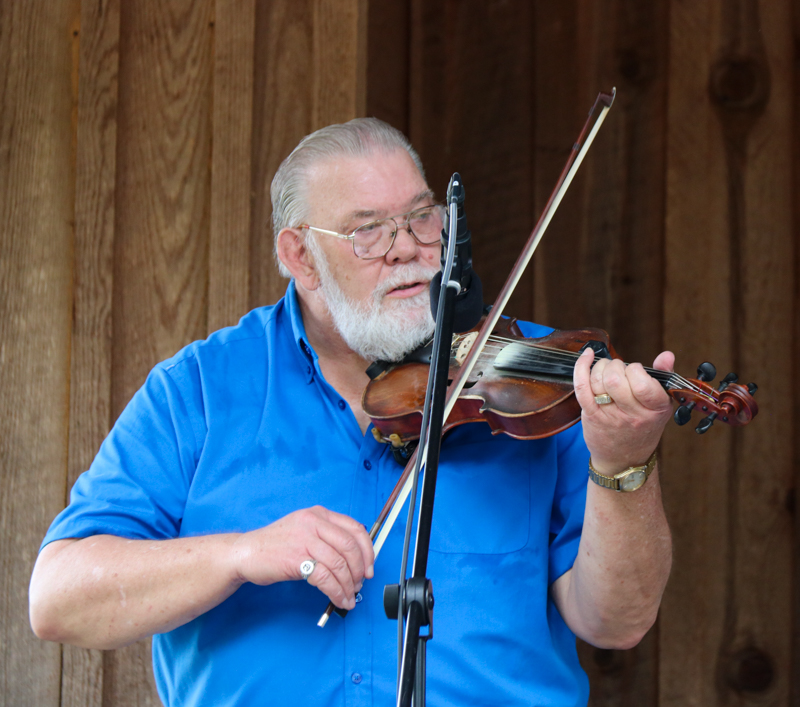 Johnny Ridge with Charlie Oakley & Bl;azin' Grass at the final Willow Oak festival in June 2026 - photo © Laura Ridge