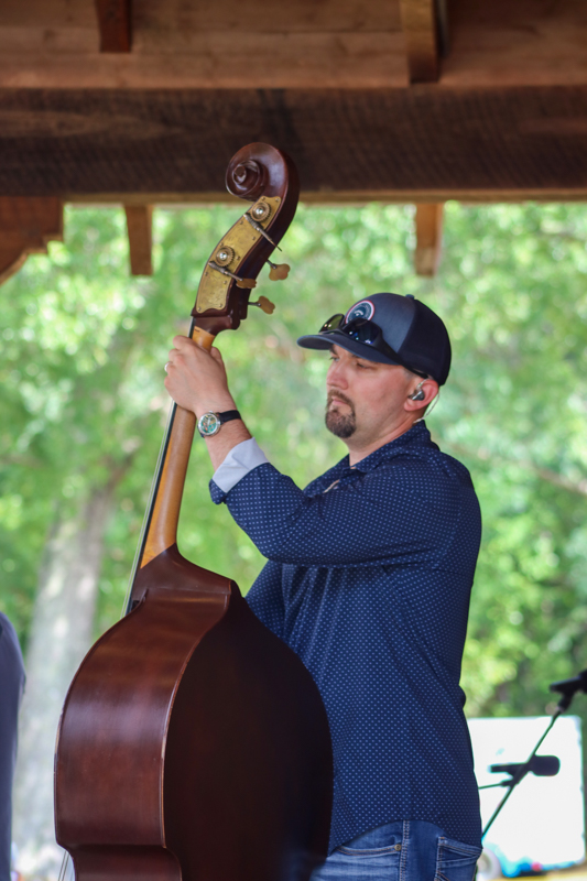 Kameron Keller with Lonesome River Band at the final Willow Oak festival in June 2026 - photo © Laura Ridge