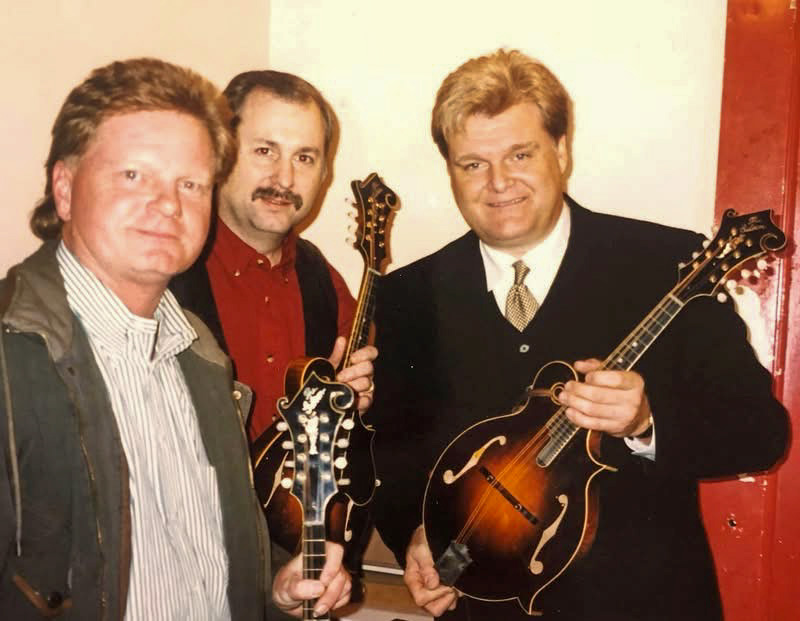 Darryl Wolfe, Tom Isenhour, and Ricky Skaggs