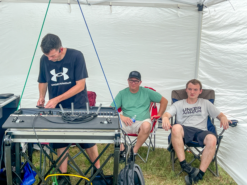 JMP Production staff Justin Plaster, Jason Hughes, and Alan Plaster at the 2026 Willow Oak Bluegrass Festival - photo © Sandy Hatley