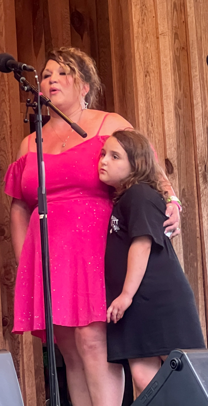 Starlett Boswell and her daughter at the 2026 Willow Oak Bluegrass Festival - photo © Sandy Hatley