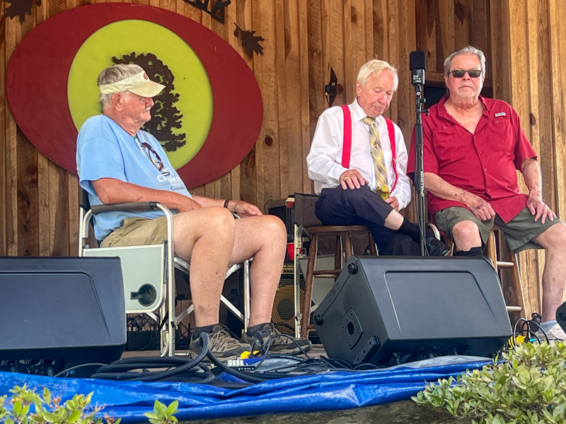 Mike Wilson, Little Roy Lewis, and Buddy Michaels share memeories at the final Willow Oak festival - photo © Sandy Hatley