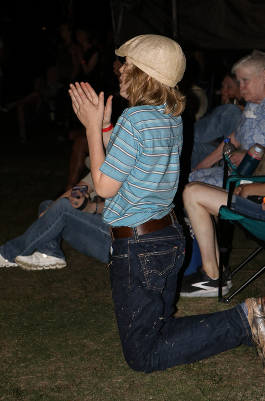 Miles Kexel applauding for mom in dance competition at the 2026 Mount Airy Fiddlers' Convention - photo © G. Nicholas Hancock