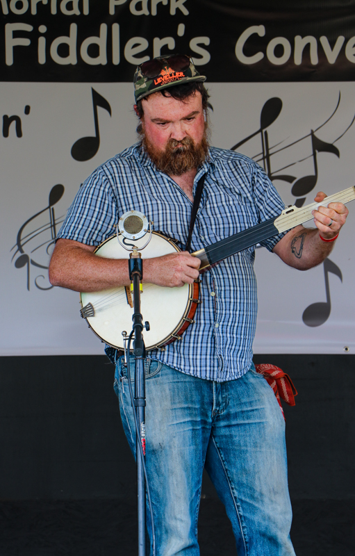 Old-time banjo player at the 2026 Mount Airy Fiddlers' Convention - photo © G. Nicholas Hancock