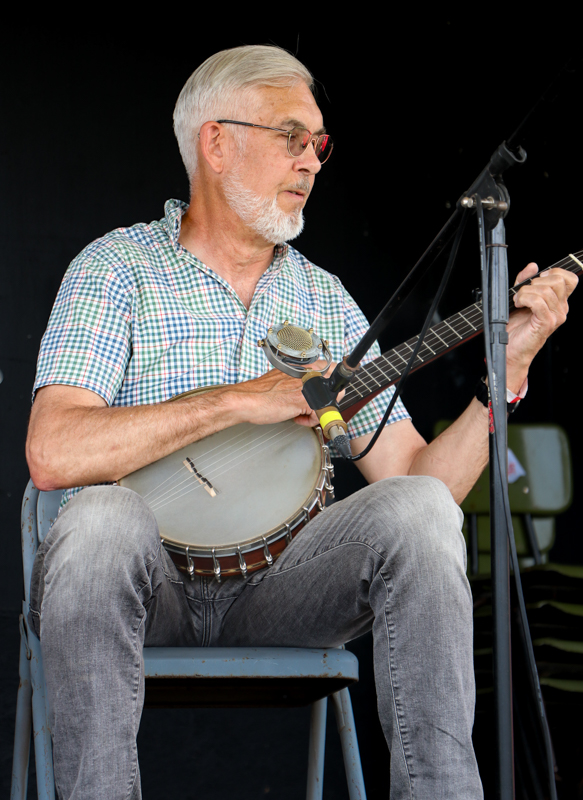 Old-time banjo player at the 2026 Mount Airy Fiddlers' Convention - photo © G. Nicholas Hancock