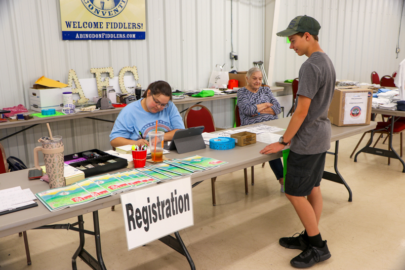 Shawn Ripple registering for competition at the 2026 Abingdon Fiddlers' Convention - photo © G. Nicholas Hancock