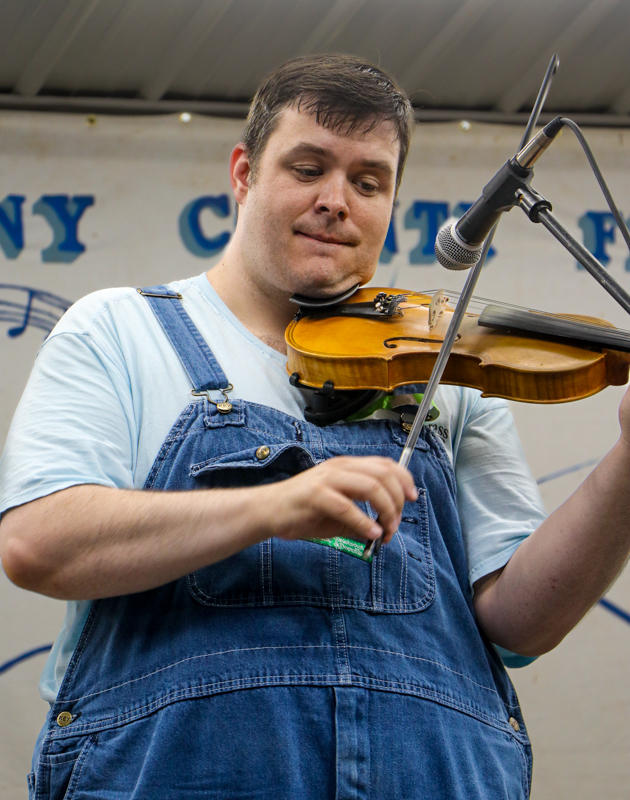 Adam Burrows with Granite City Grass at the 2026 Alleghany County Fiddlers' Convention - photo © G. Nicholas Hancock