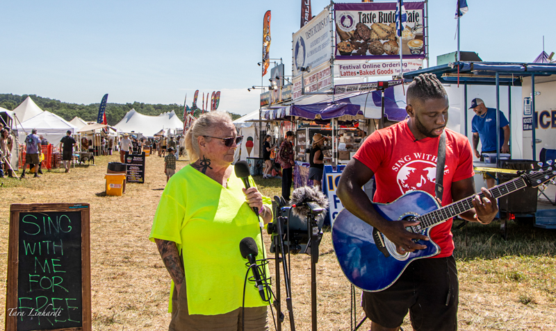 Guitar 5000 streaming with attendees at the 2026 Grey Fox Bluegrass Festival - photo © Tara Linhardt