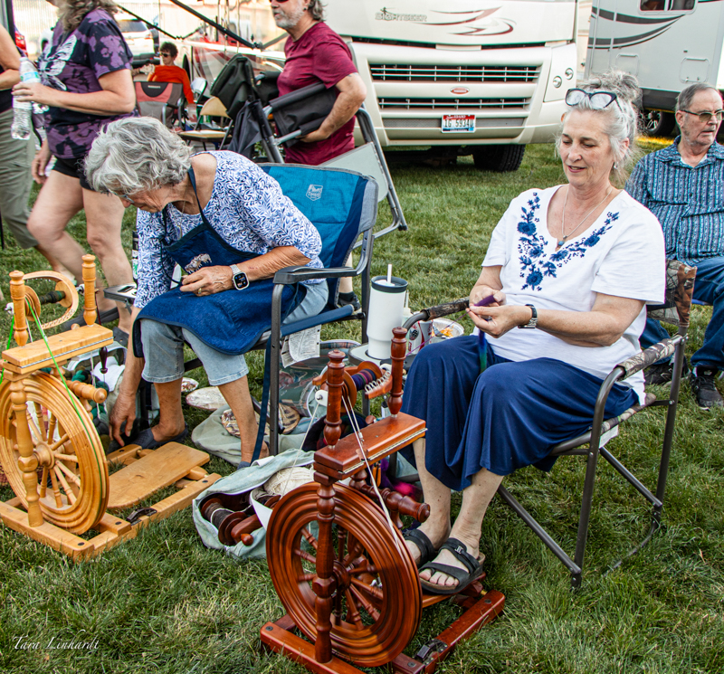 Audience members spinning away to the music of the Banjo-Fiddle Contest 2026 at the 2026 National Oldtime Fiddlers' Contest & Festival - photo © Tara Linhardt