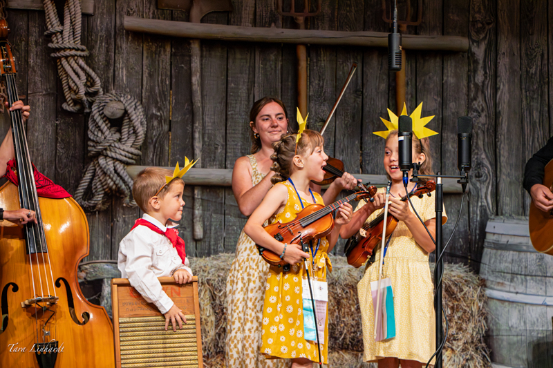Certified Contestants doing You Are My Sunshine at the 2026 National Oldtime Fiddlers' Contest & Festival - photo © Tara Linhardt