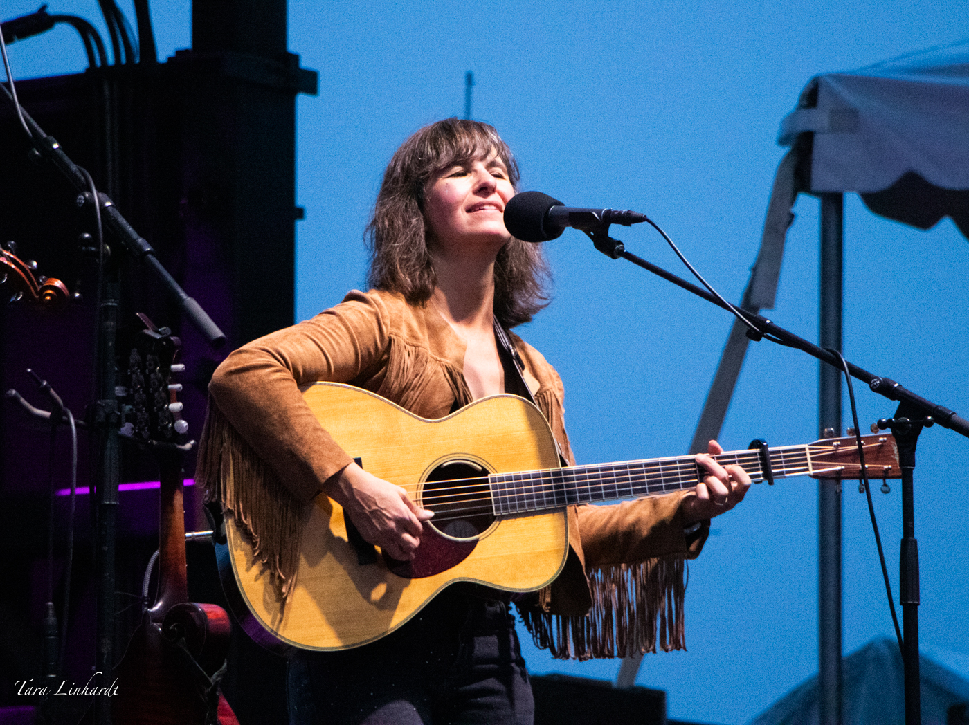 Avril Smith with Della Mae at the 2026 Grey Fox Bluegrass Festival - photo © Tara Linhardt