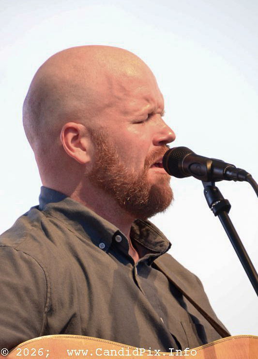 Jesse Smathers with the Lonesome River Band at Industrial Strength Summer Fest 2026 - photo © Bill Warren