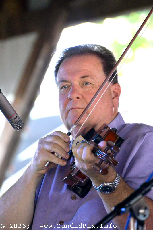 Steve Day with the Riley Gilbreath Band at the 2026 Marshall Bluegrass Festival - photo © Bill Warren