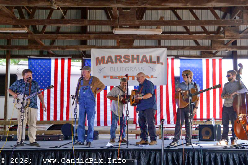 Dana Cupp, Gavin Conley, Gil Benson, Stan Bush, Tony Zapolnik in the band scramble at the 2026 Marshall Bluegrass Festival - photo © Bill Warren