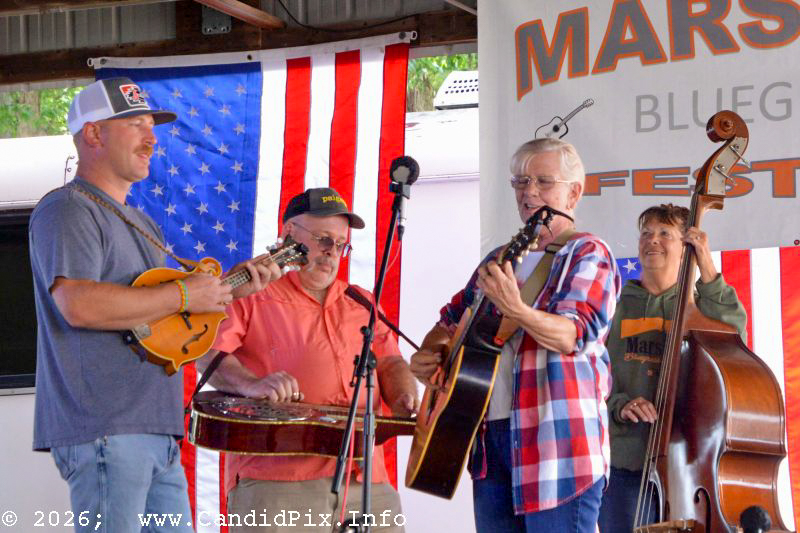 Caleb Daugherty on mandolin and Deanna Riggenbach on bass in the band scramble at the 2026 Marshall Bluegrass Festival - photo © Bill Warren