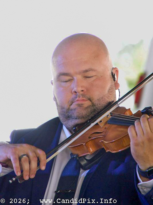 Mason Wright with Junior Sisk & Ramblers Choice at the 2026 Marshall Bluegrass Festival - photo © Bill Warren