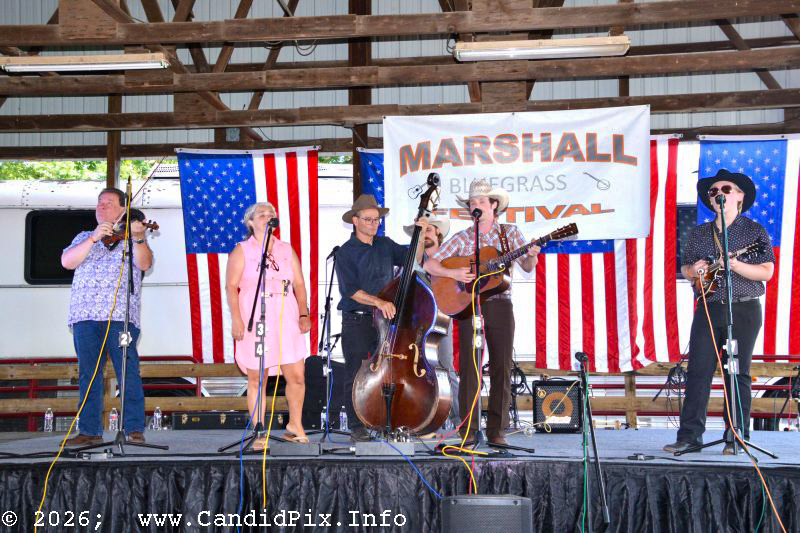 Riley Gilbreath's mother Janet joins him and Lone Star Blue at the 2026 Marshall Bluegrass Festival - photo © Bill Warren