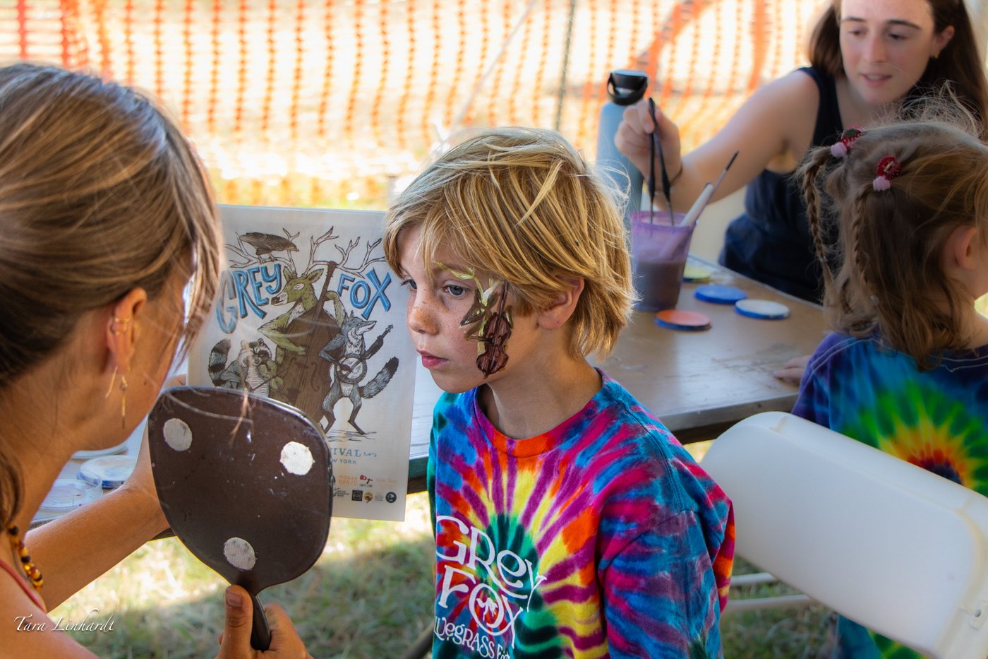 Face painting at the 2026 Grey Fox Bluegrass Festival - photo © Tara Linhardt