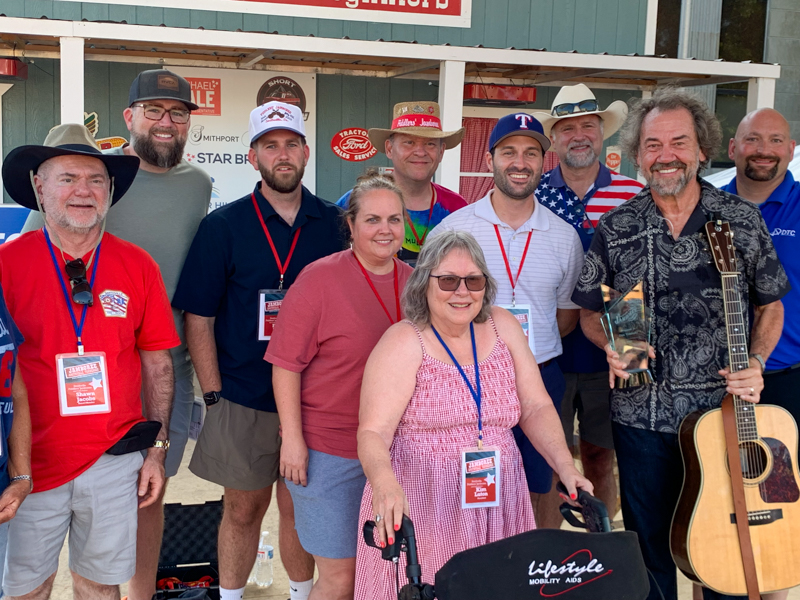 Dan Tyminski with the staff at the Smithville Fiddlers Jamboree (7/4/26) - photo © Bill Conger