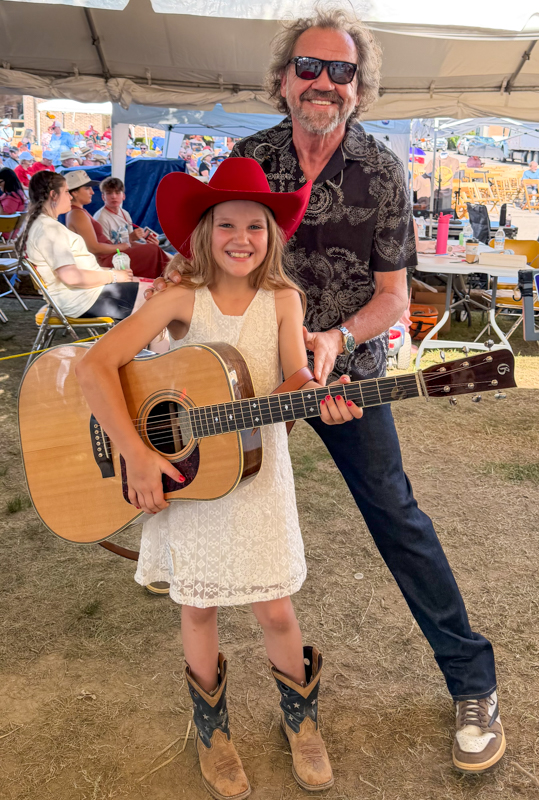 Isley Dietrich with Dan Tyminski at the 2026 Smithville Fiddlers Jamboree - photo © Tiffany Dietrich